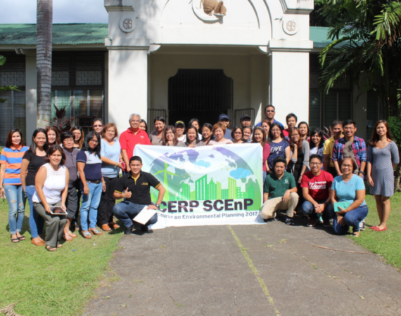 Attendees of the Short Course on Environmental Planning 2017 pose in the infamous grasshopper at the facade of CHE.